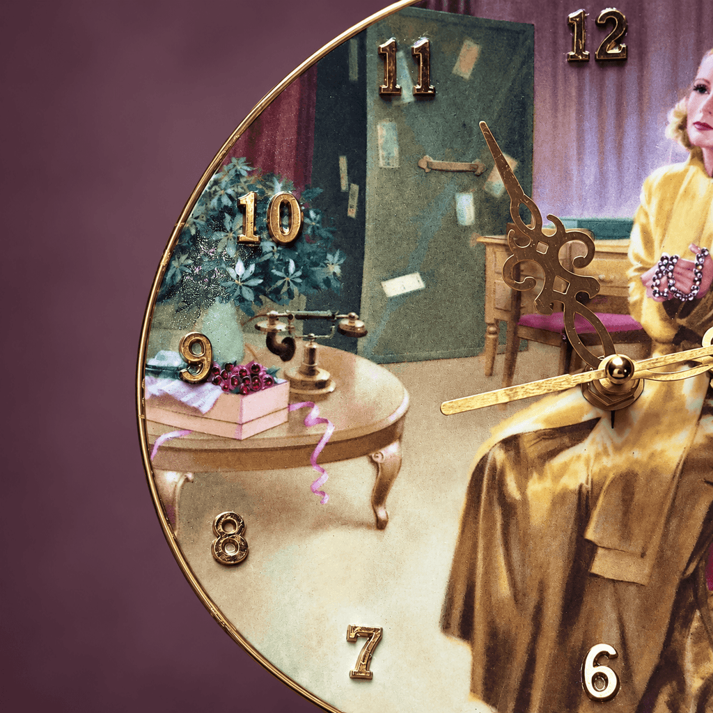Greta Garbo collector plate clock with antique-gold numbers and ornate clock hands