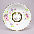Lavender floral plate clock with pink and lavender flowers, green leaves and a scalloped gold-edged china plate