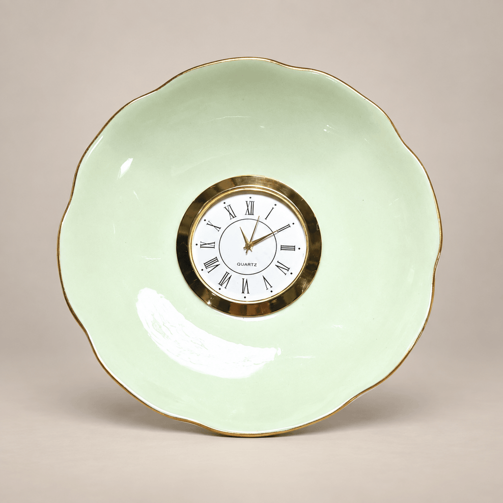 Celadon china plate clock with a pale-green scalloped plate, slender gold rim and gold Roman numeral clock face